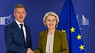 European Commission President Ursula von der Leyen, right, greets Hungary's incoming Prime Minister Peter Magyar prior to a meeting at EU heaquarters in Brussels, Wednesday, A