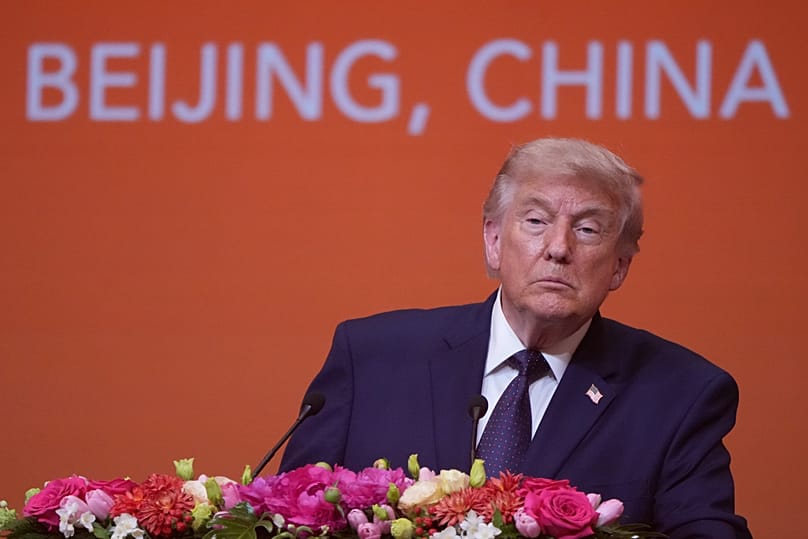 US President Donald Trump speaks during a state dinner with China's President Xi Jinping at the Great Hall of the People in Beijing, 14 May, 2026