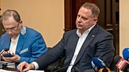 Former Ukrainian president's chief of staff, Andrii Yermak, right, is seen during court hearing in a city court room in Kyiv, Ukraine, Tuesday, May 12, 2026.