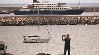 The hantavirus-stricken cruise ship MV Hondius is seen at anchor at the port of Granadilla in Tenerife, Canary Islands, Spain, Monday, May 11, 2026.