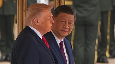 US President Donald Trump participates in a welcome ceremony with China's President Xi Jinping at the Great Hall of the People in Beijing, 14 May 2026