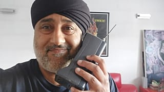 Singh Lall's most prized possession is a vintage Motorola 'Brick' phone from the 80s. 