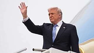 US President Donald Trump waves as he boards Air Force One at Beijing Capital International Airport, 15 May, 2026
