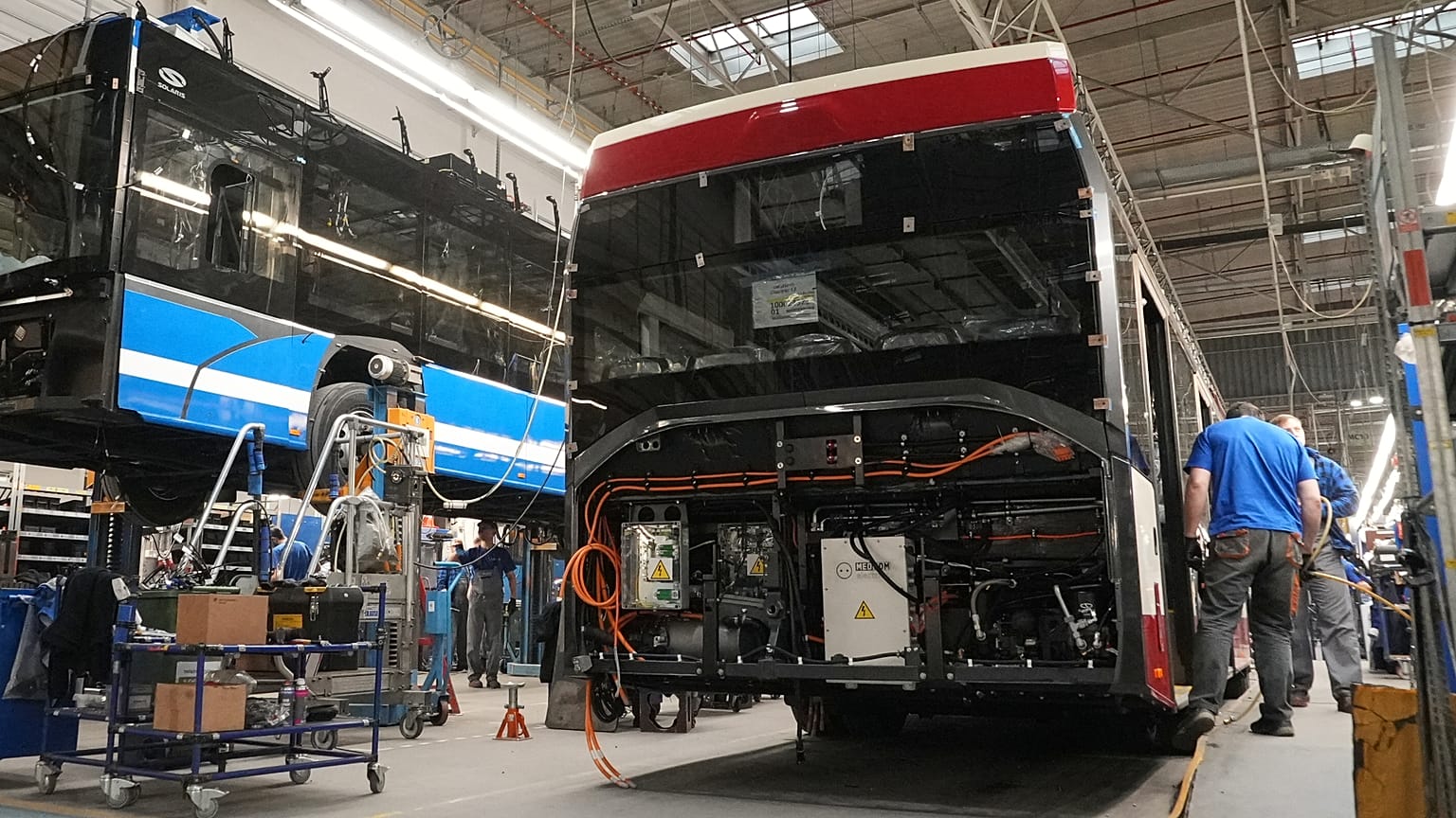 Workers prepare electric buses at the Solaris bus factory in Poznan, Poland, Thursday, Jan. 29, 2026. 