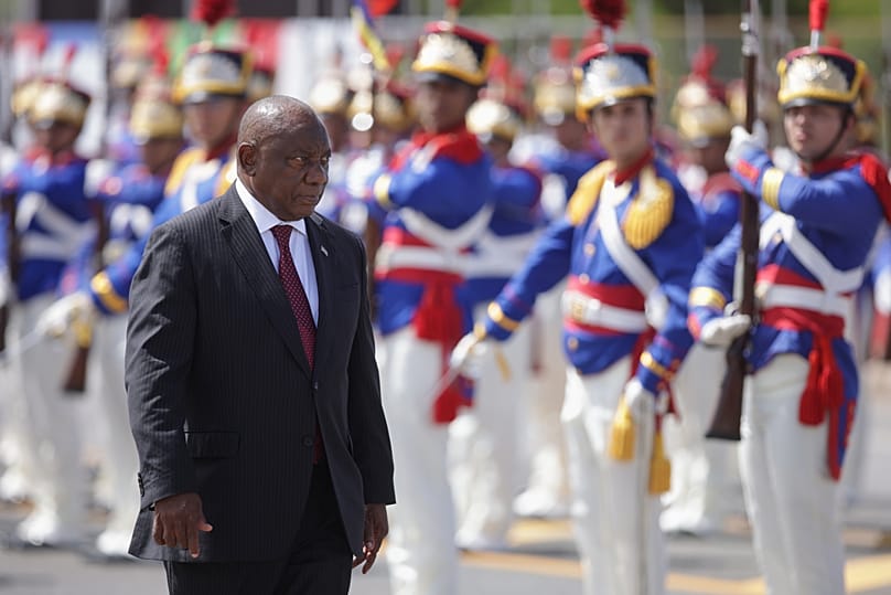 South Africa's President Cyril Ramaphosa receives military honours during a welcome ceremony at the Planalto Presidential Palace in Brasilia, 9 March, 2026