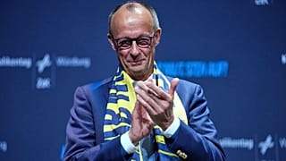 Chanceler federal Friedrich Merz participa, durante o Dia Alemão dos Católicos, na sexta-feira, 15 de maio de 2026, em Würzburg, num debate com jovens.