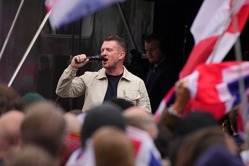 Far-right agitator Stephen Yaxley-Lennon, known by his pseudonym Tommy Robinson speaks during an Unite the Kingdom rally in London, Saturday, May 16, 2026.