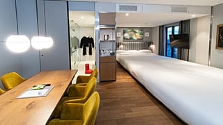 The Curator Suite’s massive bed turns sleep into a spectacle 