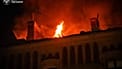 In this photo provided by the Ukrainian Emergency Services on Monday, May 18, 2026, a building is seen on fire after a Russian strike on Odesa, Ukraine.
