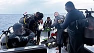 Divers preparing to search for the four missing Italian divers near Alimathaa Island, 15 May, 2026
