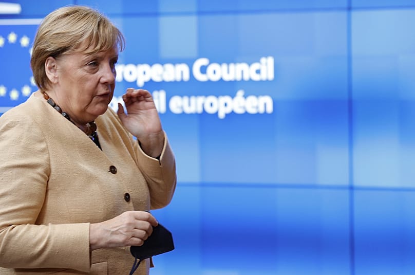 German Chancellor Angela Merkel arrives for an EU summit at the European Council building in Brussels. (AP Photo/Olivier Matthys, Pool)