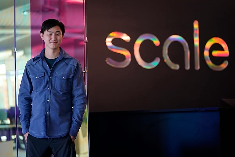 FILE. Scale AI founder and CEO Alexandr Wang poses for photos at the company's office in San Francisco, California, May 2023