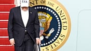 President Donald Trump walks down the stairs of Air Force One upon his arrival at Joint Base Andrews, Md., Friday, May 15, 2026