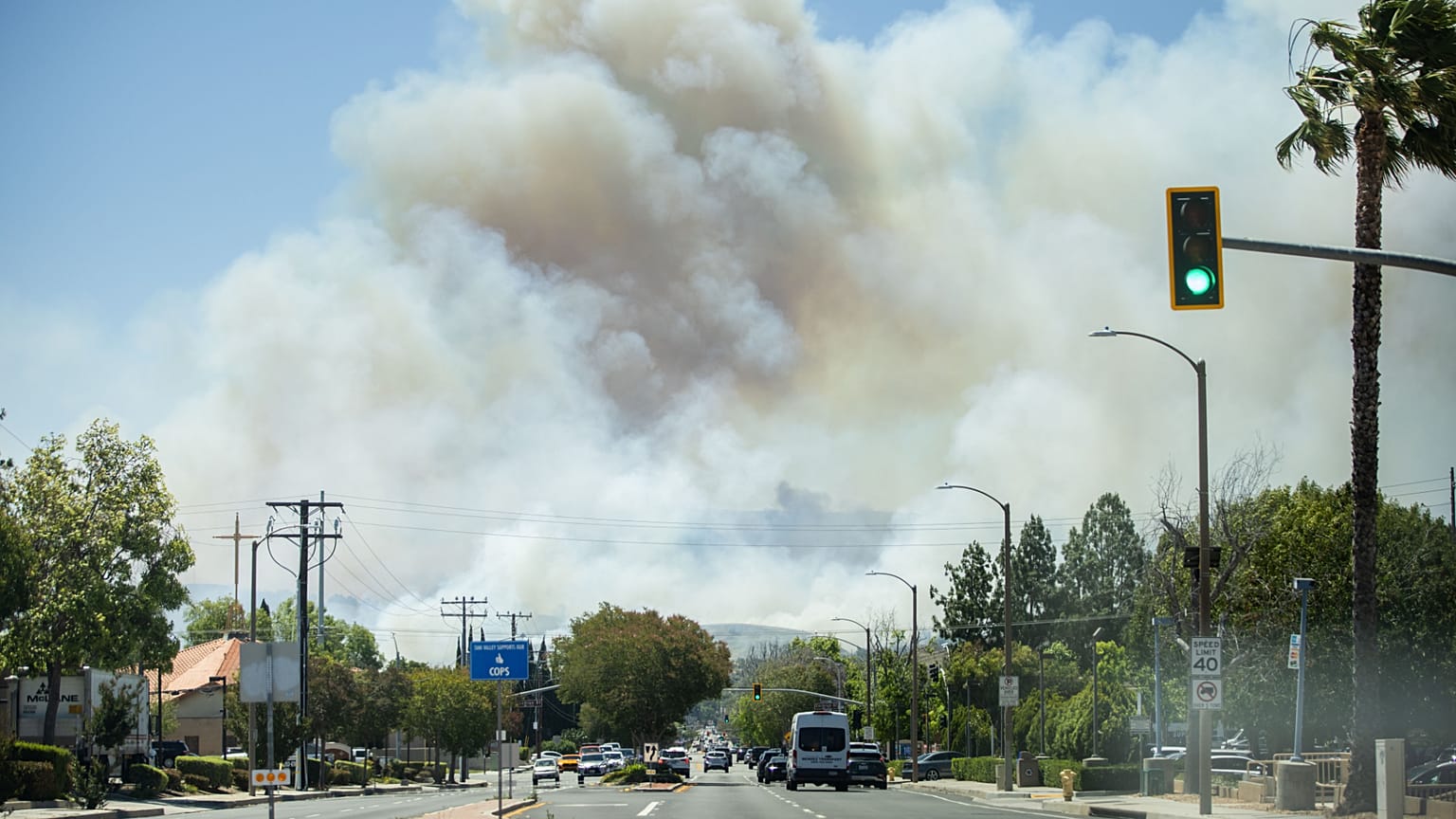 The Sandy Fire sends a plume of smoke in the air on Monday, May 18, 2026, in Simi Valley, Calif.
