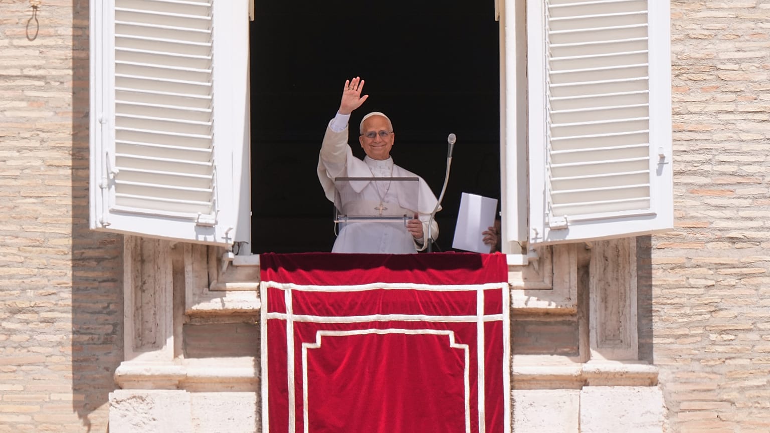 Pope Leo XIV delivers his blessing as he recites the Regina Coeli noon prayer from the window of his studio overlooking St. Peter's Square, at the Vatican,  May 17, 2026