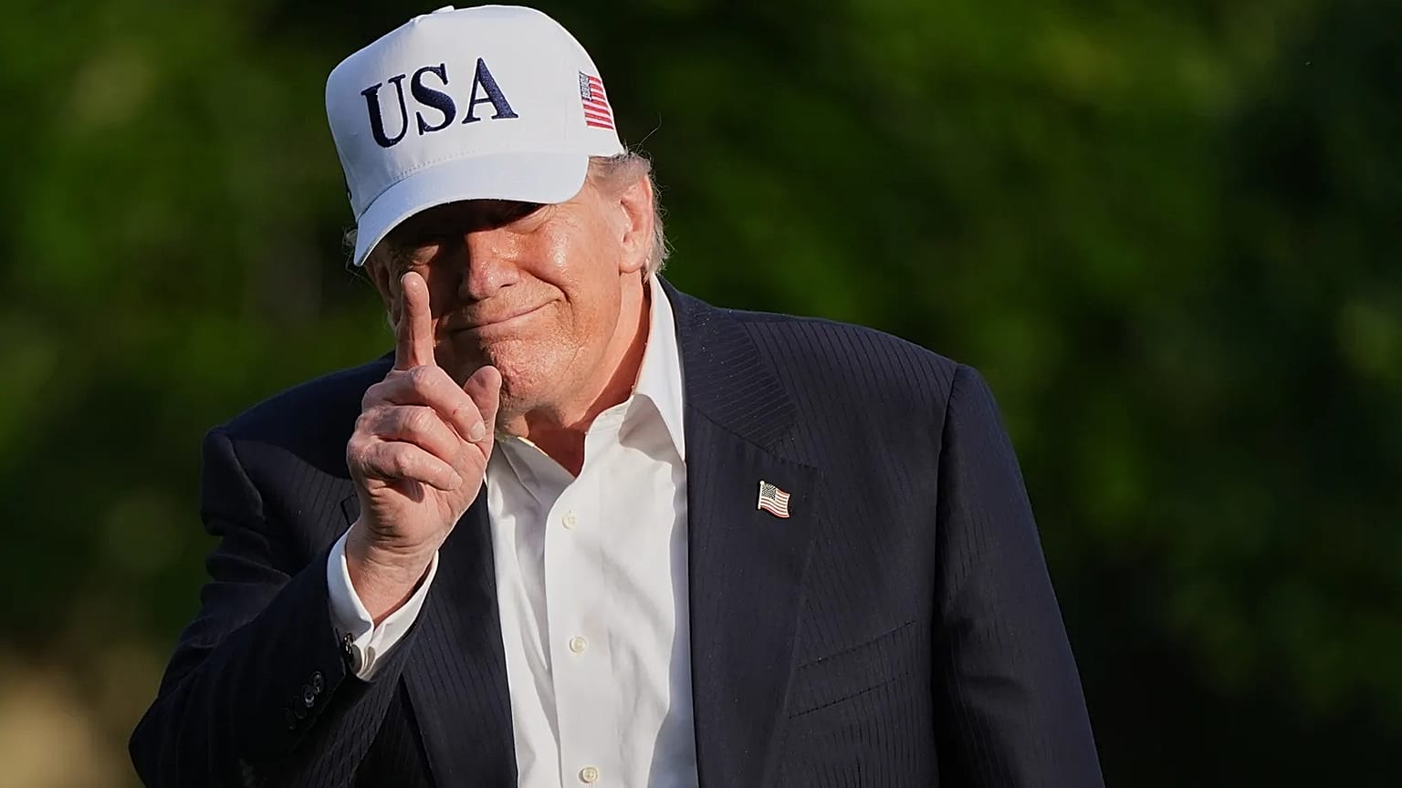 President Donald Trump walks across the South Lawn of the White House, Friday, May 15, 2026, in Washington, on return from Beijing.
