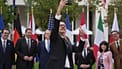 French Finance Minister Roland Lescure takes a selfie picture as G7 Finance Ministers and Central Bank Governors pose for a family photo at the G7 finance meeting in Paris