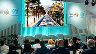 Participants take part in the WUF13 opening ceremony in Baku, 17 May 2026