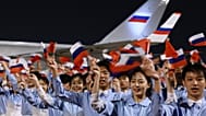 Des jeunes Chinois accueillent le président russe Vladimir Poutine à Pékin, mardi 19 mai 2026