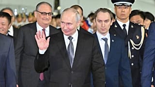 In this photo released by Xinhua News Agency, Russian President Vladimir Putin arrives for a state visit in Beijing on Tuesday, May 19, 2026