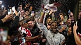 Arsenal supporters gather to celebrate at the Arsenal stadium after Arsenal's soccer team won the Premier League title in London, Tuesday, May 19, 2026.