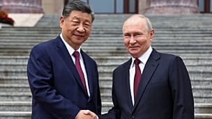Russian President Vladimir Putin and Chinese President Xi Jinping shake hands during a welcome ceremony at the Great Hall of the People, in Beijing, China, May 20, 2026. 
