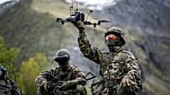 A soldier with a drone during a Swiss Army press event in Elm, Switzerland, on 18 May 2026.