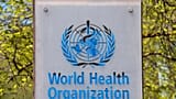 The logo and building of the World Health Organization (WHO) headquarters in Geneva, Switzerland, April 15, 2020. 