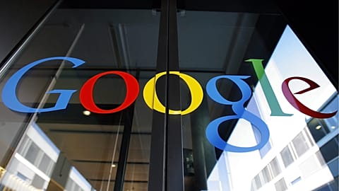 FILE - This Thursday, March 6, 2008 file photo shows the logo of Google on the front door of the new Google European tech center in Zurich, Switzerland