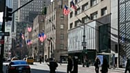 American flags wave in the wind on Fifth Avenue in the borough of Manhattan in New York City on Friday, Jan. 21, 2022. (AP Photo/Ted Shaffrey, file)