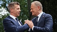 Poland's Prime Minister Donald Tusk, right, and Hungarian Prime Minister Peter Magyar shake hands after a joint press conference in Warsaw, Poland, Wednesday, May 20, 2026. 
