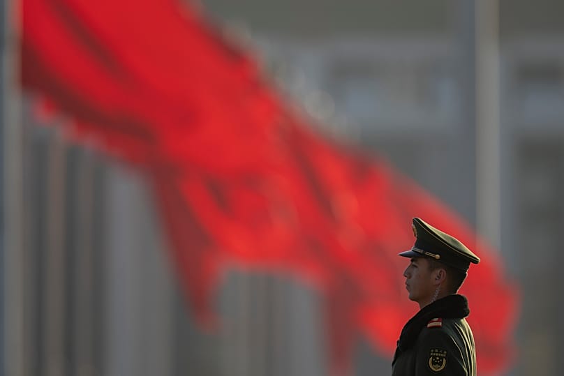 A Chinese paramilitary policeman stands guard on Tiananmen Square in Beijing, 11 March, 2026