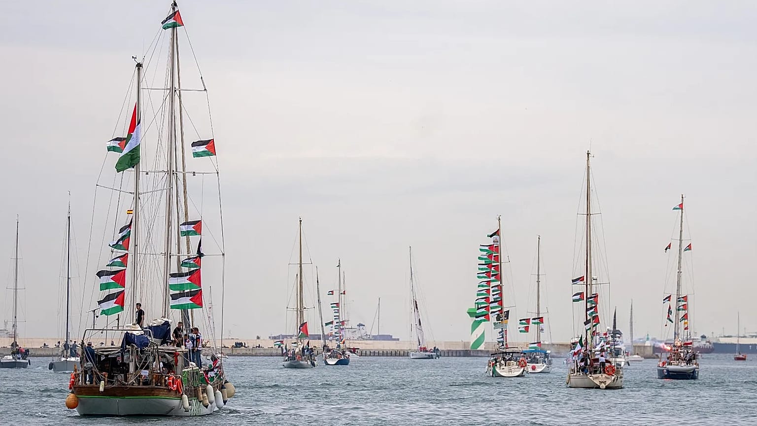 Boats carrying activists and humanitarian aid for Palestinians in Gaza reposition in port in Barcelona, 12 April, 2026