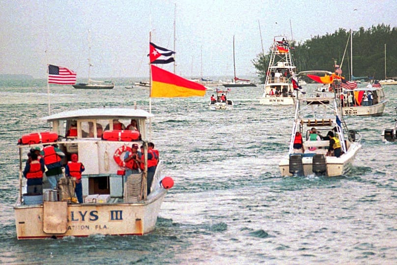 Some of the boats from the flotilla carrying Cuban Americans head for open waters off Key West, 2 March, 1996 