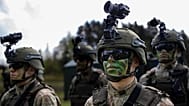 Lithuanian soldiers take part in a Lithuanian-Polish military exercise in Lithuania on April 26, 2024.