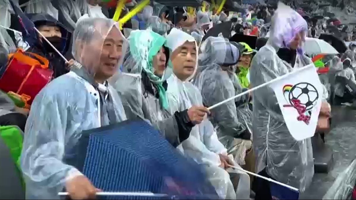 North and South Korean women meet in rare football clash as fans cheer both sides