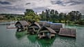 FILE - The once iconic Holiday Inn villas in Port Vila, Vanuatu, sit partially sunken, July 19, 2025, after being hit by multiple cyclones and an earthquake. 