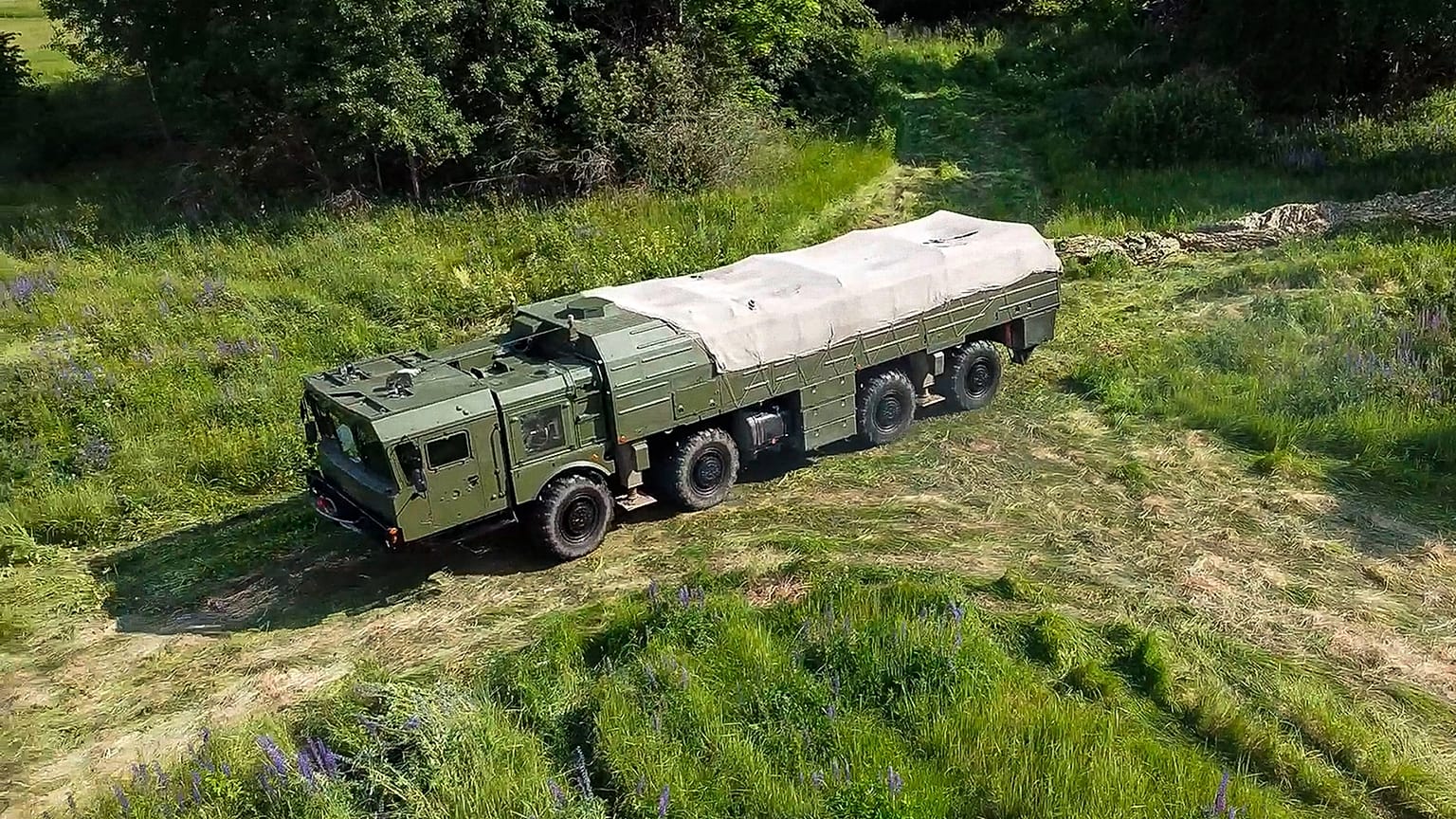 FILE - A truck of Iskander-M short-range ballistic missile launchers moves to a firing position as part of Russian military drill, June 12, 2024