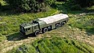 FILE - A truck of Iskander-M short-range ballistic missile launchers moves to a firing position as part of Russian military drill, June 12, 2024