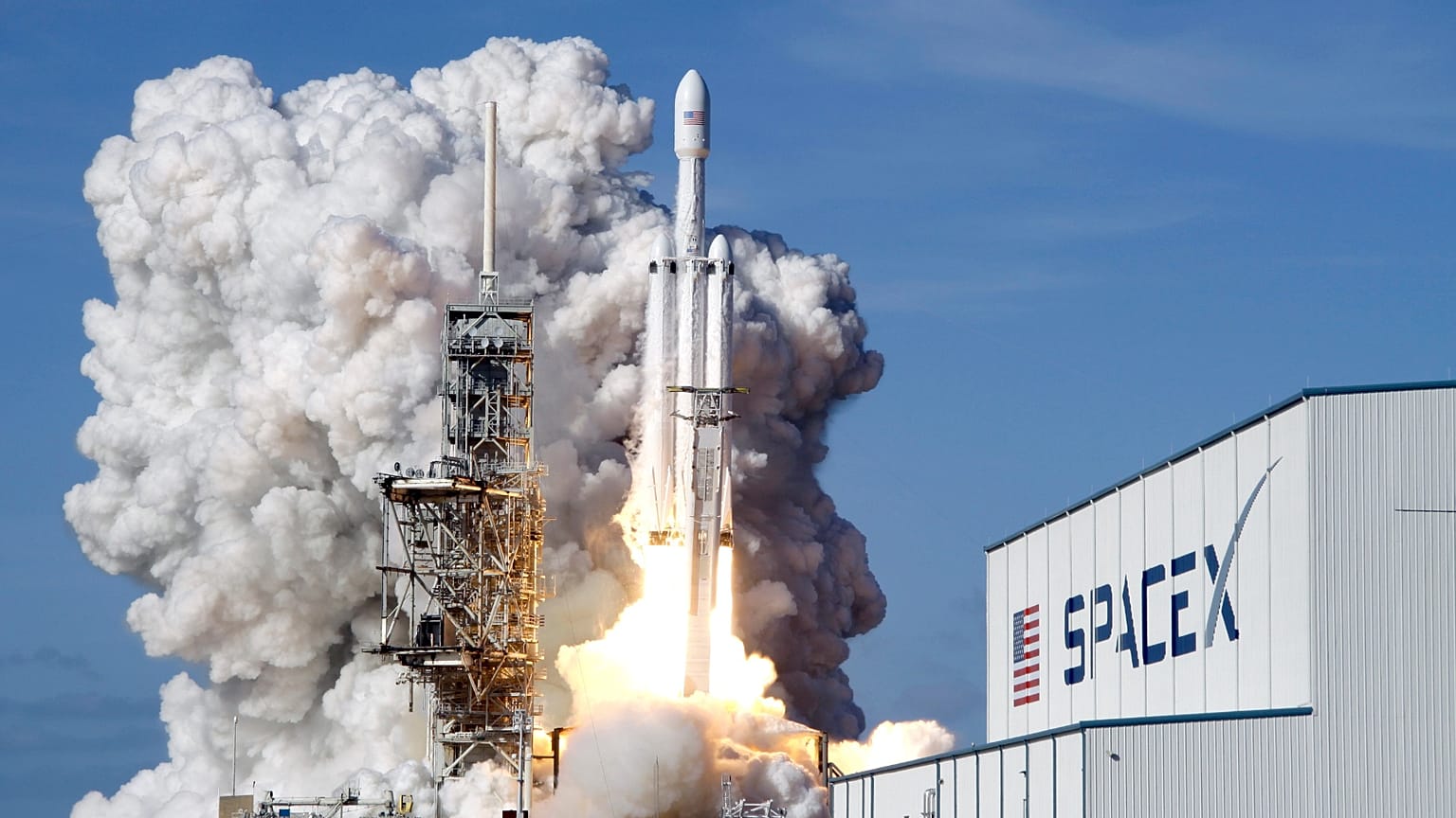 FILE - A Falcon 9 SpaceX heavy rocket lifts off from pad 39A at the Kennedy Space Center in Cape Canaveral, Florida. February 6, 2018.