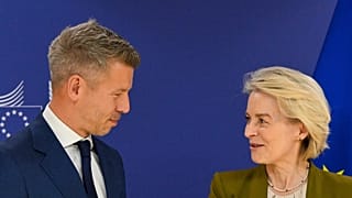 European Commission President Ursula von der Leyen, right, speaks with Hungary's incoming Prime Minister Peter Magyar prior to a meeting at EU heaquarters in Brussels, Wednesd