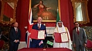 Britain Minister of State for Trade Chris Bryant and Jasem Mohamed Albudaiwi from the Gulf Cooperation Council take part in a signing ceremony in London. May 20, 2026. 