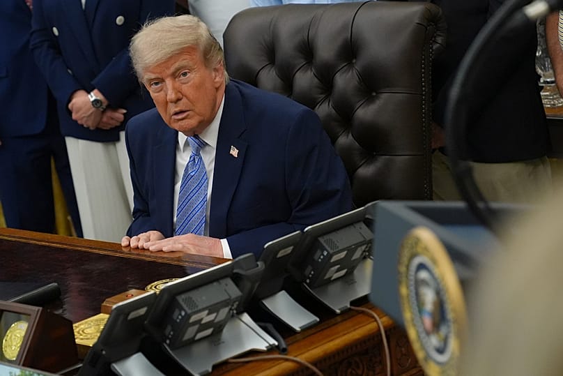 US President Donald Trump attends an event about loosening a federal refrigerant rule, in the Oval Office at the White House, Thursday, May 21, 2026, in Washington