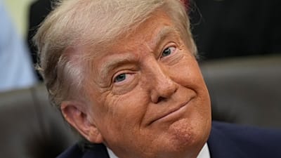 President Donald Trump takes part in an event devoted to easing federal regulations on refrigerants in the Oval Office of the White House, 21 May 2026