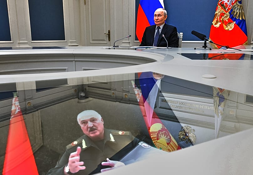Vladimir Putin and Aliaksandr Lukashenka take part in a video call as part of joint nuclear drills at the Presidential Situation Centre at the Kremlin in Moscow, May 21, 2026