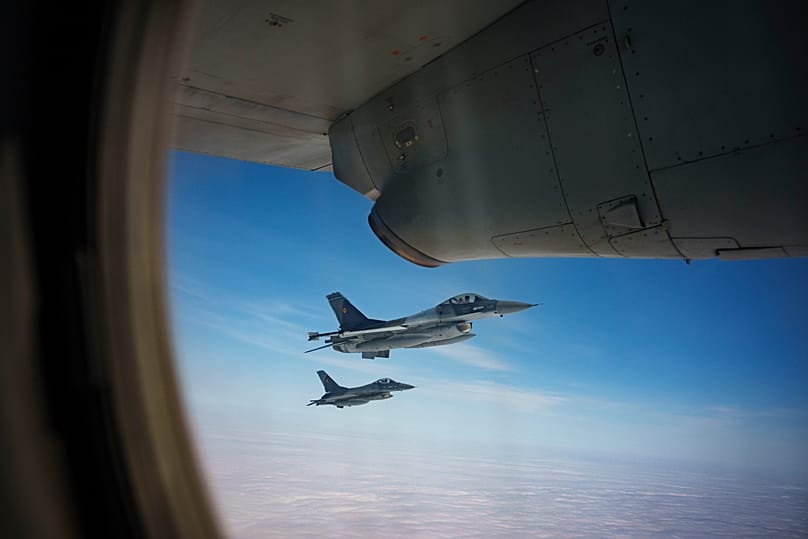Romanian Air Force F-16 military fighter jets escort a C-27J Spartan aircraft during a NATO Air Policing exercise above eastern Romania, on 6 March, 2024. 