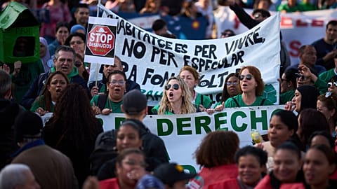 People take part in a protest over soaring housing costs in Barcelona, Spain, on Saturday 5 April 2025. (AP Photo/Emili