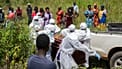 Red Cross workers prepare a coffin containing the body of the Ebola victim for burial at the Rwampara Cemetery, in Bunia, Congo, Saturday, May 23, 2026.