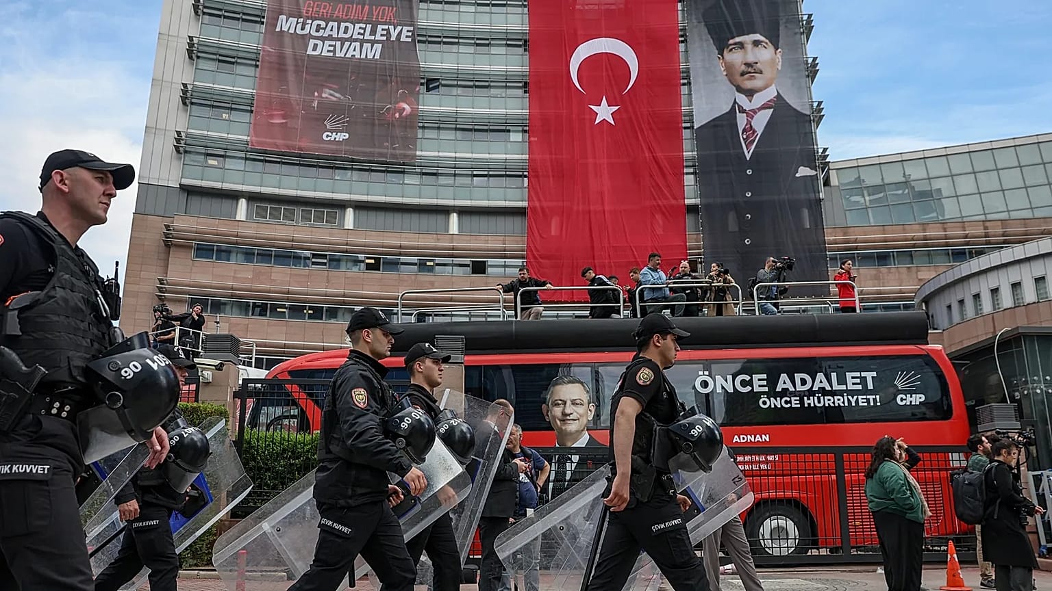 Police officers arrive at Turkey's main opposition Republican People's Party (CHP) headquarters in Ankara, Sunday, May 24, 2026, to evict supporters gathered inside. 