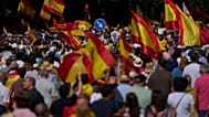 Demonstrators holding Spanish flags take part in a protest against Prime Minister Pedro Sanchez's government in Madrid, Spain, Saturday, May 23, 2026.